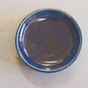 Small saucer/ring dish.  Stoneware clay